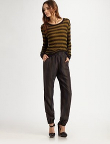 Shimmering silk style with a comfortable elastic waistband and flared pant legs. Elastic waistbandSlash pocketsSilkDry cleanImported Shimmering silk style with a comfortable elastic waistband and flared pant legs. Elastic waistbandSlash pocketsSilkDry cleanImported