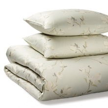 A delicate pattern of white flowers adorn the elegant branches on this Calvin Klein duvet set. The porcelain hue duvet and sham exude peaceful elegance and sweet dreams. A delicate pattern of white flowers adorn the elegant branches on this Calvin Klein duvet set. The porcelain hue duvet and sham exude peaceful elegance and sweet dreams.