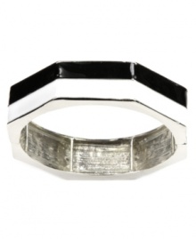 Earn your stripes with this trendy style. Nine West's chic colorblock bangle is perfect for stacking with its black and white enamel design and silver tone mixed metal setting. Bracelet stretches to fit wrist. Approximate diameter: 2-1/2 inches. Earn your stripes with this trendy style. Nine West's chic colorblock bangle is perfect for stacking with its black and white enamel design and silver tone mixed metal setting. Bracelet stretches to fit wrist. Approximate diameter: 2-1/2 inches.