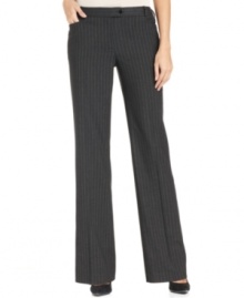 Menswear-inspired pinstripes get a fluid, feminine makeover from the master of minimalism, Calvin Klein. Menswear-inspired pinstripes get a fluid, feminine makeover from the master of minimalism, Calvin Klein.