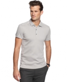 Need a style lift? This slim-fit polo shirt from Calvin Klein adds some sophisticated muscle to your polished look.