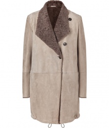 Work a contemporary edge into your opulent outerwear wardrobe with Brunello Cucinellis exquisitely luxurious (and incredibly soft) stone shearling coat - Dropped angular shawl lapel, long sleeves, buttoned front with single hidden snap closure, side slit pockets, drawstring hemline - Contemporary straight fit - Team with supple leather leggings and statement ankle boots Work a contemporary edge into your opulent outerwear wardrobe with Brunello Cucinellis exquisitely luxurious (and incredibly soft) stone shearling coat - Dropped angular shawl lapel, long sleeves, buttoned front with single hidden snap closure, side slit pockets, drawstring hemline - Contemporary straight fit - Team with supple leather leggings and statement ankle boots