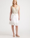 You will instantly fall in love with the elegant embroidery on this linen skirt. Its flared silhouette offers a flattering fit as its contrast piping completes this feminine look.Contrast piping at waistbandGrosgrain self-tie beltPleat details at waistSlash pocketsHook-and-eye closureEmbroidered hemConcealed back zipperAbout 22 longLinenDry cleanImported