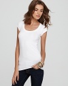 Refreshingly sleek with a touch of body-con stretch, this luxe Theory tee is a chic essential.