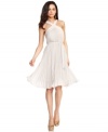 BCBGMAXAZRIA's dress is completely magnetic: a flirty cut with classic pleating makes for a smoldering style.