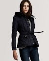 Chic and classic, this lightweight quilted jacket from Burberry Brit is the essential top layer for fall.