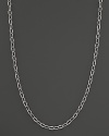 A chain of 18K yellow gold and sterling silver--perfect for your favorite enhancers and pendants.