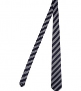 Elegant tie in fine, pure silk - Luxe material has a smooth, satin-like finish - Classically cool in navy blue and grey stripes - New cut is slim and decidedly sleek - Modern and polished, ideal for pairing with narrow-cut suits