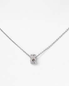 With a crystal-encrusted knot pendant, Chrislu's understated silver chain adds a delicate shot of sparkle to any look. Show it off against a plunging neckline.