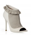 These quirky-chic booties channel antique elegance with a decidedly modern aesthetic - Linen front detail, leather-detailed peep toe and back, ruffle at ankle, stiletto heel - Wear with a flirty cocktail frock, fishnets, and a fur-trimmed jacket