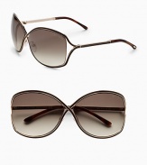 Metal crossover butterfly shaped frame enhanced with enamel insert. Available in shiny rose gold with dark brown enamel and brown gradient lens.100% UV protection Made in Italy