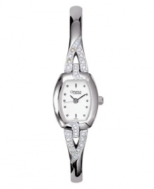A twist of elegance takes this Caravelle by Bulova timepiece to the next level of style. Mixed metal bangle bracelet with crystal detailing and mixed metal case. Crystal-accented bezel. White dial with logo and circle markers. Quartz movement. Water resistant to 30 meters. Two-year limited warranty. A twist of elegance takes this Caravelle by Bulova timepiece to the next level of style. Mixed metal bangle bracelet with crystal detailing and mixed metal case. Crystal-accented bezel. White dial with logo and circle markers. Quartz movement. Water resistant to 30 meters. Two-year limited warranty.
