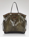 Embrace reptile style with this embossed leather tote from Longchamp, which features a glossy snakeskin motif and deceptively roomy exterior for a look that's poisonously practical.