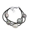 When modest tradition and modern edge combine. This chic, new style by Majorica features three rows of black leather cord strung with multicolored, organic, man-made pearls (12 mm). Setting and clasp crafted in sterling silver. Approximate length: 7-1/2 inches.