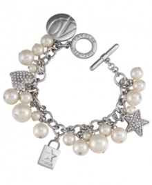 It's the magic of Macy's! Carolee combine's cute Macy's shopping bags with heart and star charms, clusters of glass pearls and crystal fireballs on this adorable charm bracelet. Setting and toggle clasp crafted in rhodium-plated mixed metal. Approximate length: 8 inches.