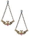 Rule the night. These nocturnal earrings from Betsey Johnson feature a bat wing design embellished with pink and clear crystal accents. Crafted in antiqued gold tone mixed metal. Approximate drop: 3 inches.