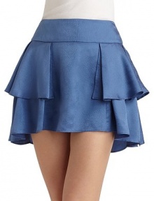 Wrap-around ruffles in shimmering silk, with a hem that dips slightly lower in back.Wide set-on waistband Ruffled detail Back hook and zipper closure About 15½ long Silk; dry clean Imported Wrap-around ruffles in shimmering silk, with a hem that dips slightly lower in back.Wide set-on waistband Ruffled detail Back hook and zipper closure About 15½ long Silk; dry clean Imported