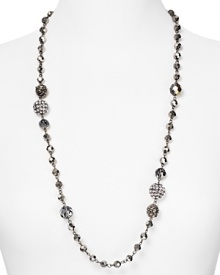 Round out your jewel box with Carolee's graduated beaded necklace. With faceted beads and fireball stations, this piece gives evening looks a hit of classic glamour.