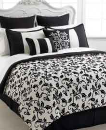 Finished with a chic black and white flair, the Carrington Leaf comforter set boasts a flourishing vine and leaf design for a simply elegant appeal. Shams and decorative pillows are embellished with a geometric diamond pattern and pleating details for added style and texture. (Clearance) Finished with a chic black and white flair, the Carrington Leaf comforter set boasts a flourishing vine and leaf design for a simply elegant appeal. Shams and decorative pillows are embellished with a geometric diamond pattern and pleating details for added style and texture. (Clearance)