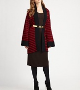 This open front, kimono shaped cardigan in drop-stitched merino wool stripes makes a stunning alternative to a jacket or sweater.Wide solid knit neckline and front trimOpen frontLong kimono-shaped sleeves with contrast cuffsAbout 36 from shoulder to hemMerino woolDry cleanImported