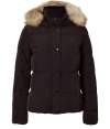 Withstand the cold, while remaining stylish, in this high quality quilted down jacket from outdoor outerwear experts Woolrich - Stand collar, raccoon fur-lined hood, snap front placket with concealed zip closure, long sleeves, zip pockets, quilted, snow and water resistant, slim fit - Perfect for a ski vacation or a chic winter-ready look