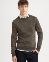 Elegant knit adds a sophisticated shimmer to a classic crewneck sweater.CrewneckRibbed knit collar, cuffs and hem91% wool/5% polyester/4% metallicDry cleanImported