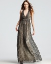 A snake print adds exotic flair to this David Meister gown, complete with sparkling rhinestone accents at the waist.