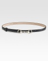 A sleek and elegant design in supple leather and radiant hardware. Width, about ½Made in Italy
