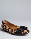 Take a bow and tie up the exotics trend in these Isaac Mizrahi New York leopard flats.