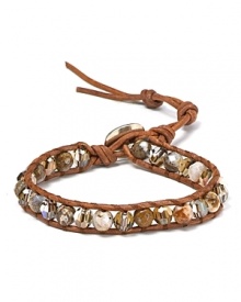 Simple yet eclectic. This Chan Luu leather wrap bracelet refines bohemian style with its mix of semi-precious gemstones and striking crystals.