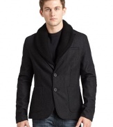 THE LOOKKnit shawl collar over self peaked lapelsTwo-button frontConcealed knit zip placketChest besom pocketDual vertical zip pocketsDual patch pocketsChest besom pocketDual flap pocketsLong sleeves with button cuffsContrast elbow patchesCenter back ventTHE FITAbout 27 from shoulder to hemTHE MATERIAL50% wool/50% polyesterSecond fabric: 98% cotton/2% elastaneFully linedCARE & ORIGINHand washImported