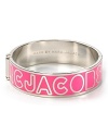 MARC BY MARC JACOBS' enamel bangle has designer appeal. Emblazoned with the label's logo, this simple silvery bracelet has fashion forward written all over it.