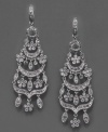 Celebrate beauty every day with these breathtaking chandelier earrings by Monet featuring crystal accents set in mixed metal. Approximate drop: 2-1/4 inches.