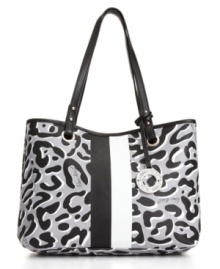 Take a walk on the wild side with a fun spin on the leopard print trend. This Nine West tote features tonal animal print exterior with bold vertical stripe accents. Take a walk on the wild side with a fun spin on the leopard print trend. This Nine West tote features tonal animal print exterior with bold vertical stripe accents.