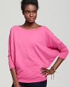 Rock this effortlessly sexy and chic top from Velvet by Graham & Spencer with skinny jeans for sleek juxtaposition.