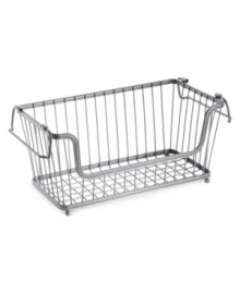 Everything in its place. Add some industrial edge to your space with this chrome basket, which features an open design for easy access to your belongings. Convenient folding handles are great for moving from room to room or folding in to create a tower of stacked baskets. Everything in its place. Add some industrial edge to your space with this chrome basket, which features an open design for easy access to your belongings. Convenient folding handles are great for moving from room to room or folding in to create a tower of stacked baskets.
