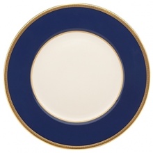 Inspired by privately commissioned presidential dinnerware, this fine china features stately navy bands and a gold border etched with patriotic stars. Inspired by privately commissioned presidential dinnerware, this fine china features stately navy bands and a gold border etched with patriotic stars.