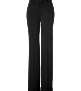 Luxurious pants made ​.​.from fine black wool - New elegant silhouette with slightly flared legs - Creases, short waistband and belt loops, side pockets - A classic AND fashionable look that works great for the office - Looks grown up, professional and dressed up - A terrific basic to wear with blouses, tops, cardigans