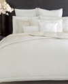 Donna Karan's quilted sham features lavish silk in a soothing white hue lending an air of refreshing elegance to the Modern Classics White Gold bedding ensemble.