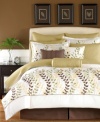 Create a nature-inspired oasis in your bedroom with this Oasis comforter set, featuring flowing rows of embroidered leaves in warm brown, green and yellow hues set on a clean white ground. Bedskirt, shams, coverlet and decorative pillows complete the set with coordinating color accents and added dimension for a look full of charm.