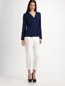 Elegantly simple, in lustrous stretch silk with a double wing collar and pleat on one side for a modern edge.V neckline with wing collar, double on one sideLong straight sleevesAngled pleat on one sideHidden placket closureAbout 24 from shoulder to hem92% silk/8% elastaneDry cleanImported Model shown is 5'9½ (176cm) wearing US size Small. 