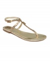 Sleek snake-print straps wrap around your ankle and down the vamp. The Molen flat thong sandals by Vince Camuto are a sexy, metallic take on the ever-popular gladiator trend.