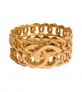 Ultra-luxe golden 1996 double C row bangle - This statement-making bracelet is authentic vintage Chanel from 1996 - Stylish gold-plated bracelet with two rows of interlocking circles and the iconic double C Chanel logo affixed on front - Amp up any outfit with this ultra-chic accessory - Perfect for cocktail attire or to dress up daywear