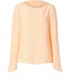 Take a minimalist stance on sophistication in Tara Jarmons nude tunic top, complete with asymmetrical cuffs for an understated modern finish - Rounded-neckline, long sleeves, slim silhouette - Style with skinny jeans, tailored business separates, or cropped trousers, and finish with ballerinas or sky-high pumps