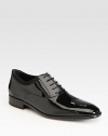 The classic lace-up crafted from sleek patent leather and rich grosgrain trim.Patent leather upperLeather liningPadded insoleLeather soleMade in Italy