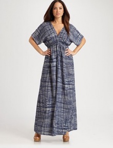 Its deep v-neckline is incredibly flattering as its smocked, Empire waist gives you the quintessential hourglass silhouette. Deep v-necklineShort sleevesSmocked, Empire waistSelf-tie detail at keyhole backAbout 47 from natural waistCottonDry cleanImported