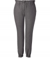 Edgy-cool grey flannel pants - These stylish statement-making flannel pants will add pop to any closet - On-trend gathered waist and tapered leg - Style with a worn t-shirt, boyfriend cardigan and ankle booties for downtown casual - Wear with a cashmere pullover and platforms