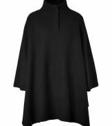 Finish your outfit on an effortless chic note with Vinces black wool poncho, the perfectly versatile knit for everything from dressing up casual separates to finishing chic cocktail looks - Ribbed knit stand-up collar with front zip, draped long sleeves, side arm slits, side slits - Oversized draped silhouette - Wear with edgy pencil skirts and high-impact black accessories