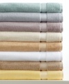 Charm your bath with comfort. This Classic tub mat from Charisma boasts luxurious Egyptian cotton for an ultrasoft hand, offered in a spectrum of  soothing hues.