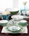 As delicate and enchanting as a peacock's plume, this whimsical salad bowl is awash in rich blues and bold greens that contrast beautifully with bone white china. Stunning embellishments of flowers and branches give this pattern a truly unique and eye-catching appeal.